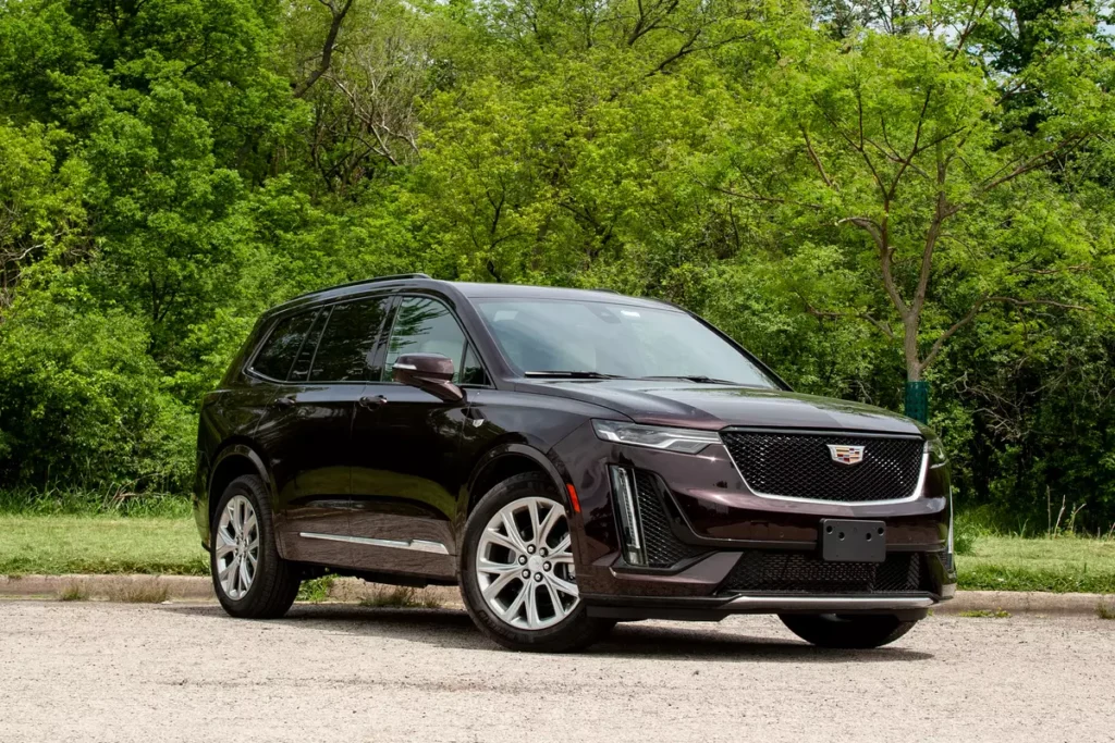 Black Cadillac XT6 luxury SUV parked outdoors premium limo service by United Limo INC.
